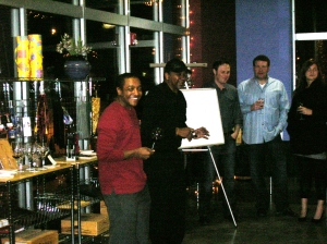 Gaither (left) and Hall (right) give explanations about their wine selections.
